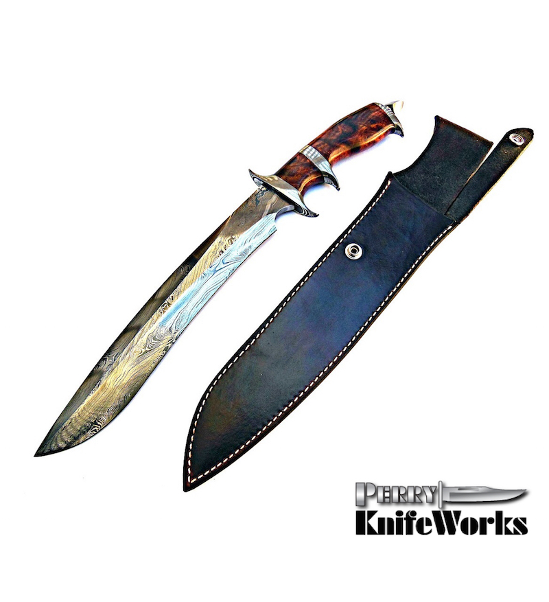 custom-forged subhilt fighter knife of damascus steel